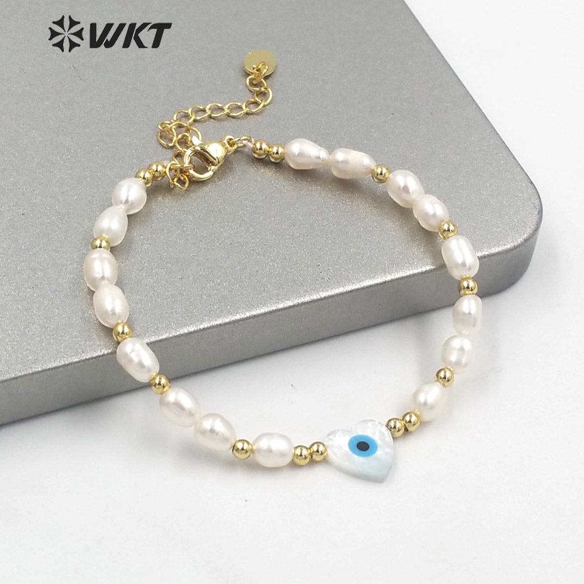 WT-MPB060 Wholesale Fashion White Freshwater Pearl Bracelet with Lobster Close Charming Shell Eye Beads Bracelet