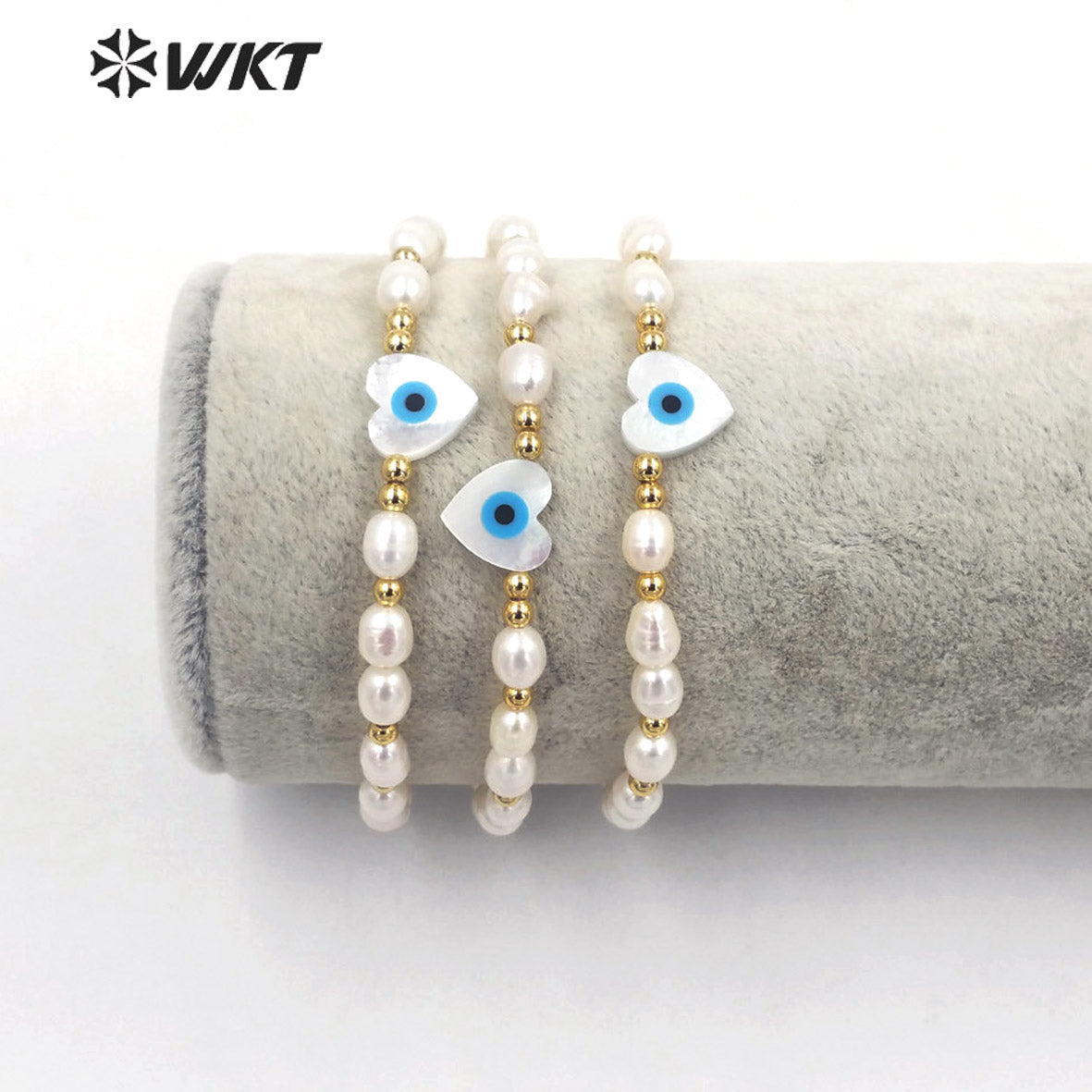 WT-MPB060 Wholesale Fashion White Freshwater Pearl Bracelet with Lobster Close Charming Shell Eye Beads Bracelet