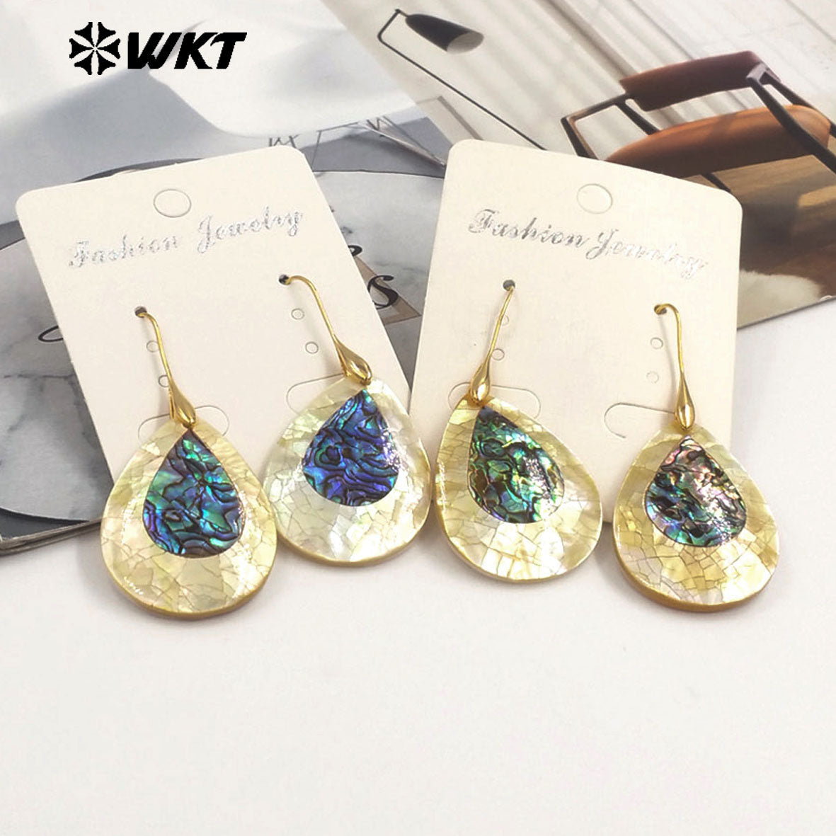 WT-MPE155 Wholesale Special Design Fashion Natural Drop Shell Earrings With Gold Color Plated Waterdrop Shape for Women