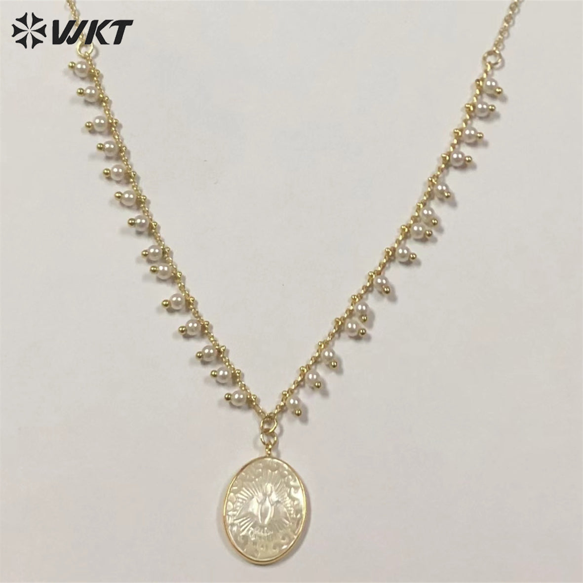 WT-JN172 WKT Wholesale Classic Oval White Shell Pendant Necklace Gold Electroplated with Mini Pearl Chain Religious Necklace